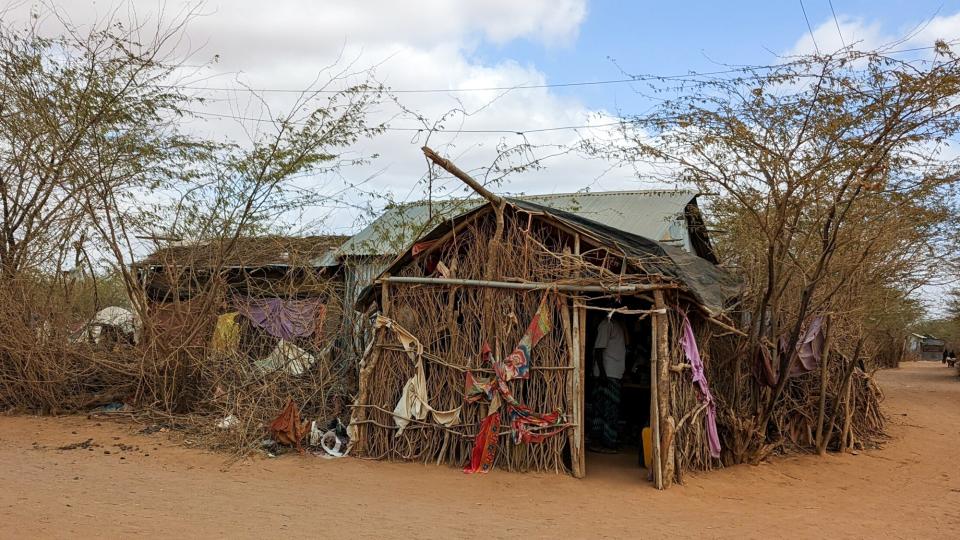 A corner shop in Ifo refugee camp (Dadaab, Kenya) at the edge of a family dwelling.