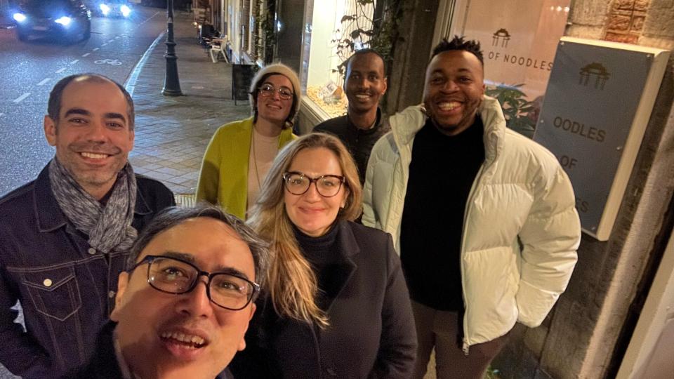 The 2022 DC cohort group; from left to right: Rodrigo, Ari, Giovanna, Karin, Abdinassir and Adam outside the Oodles of Noodles restaurant in Maastricht, where they celebrated the two year anniversary of their PhD journeys.