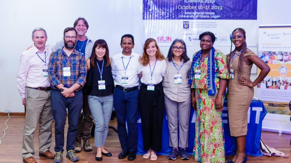 Prof. Ramani (third from right) and Maria (fourth from right) at a conference co-organised by UNU-MERIT at the University of Ghana, 2019.