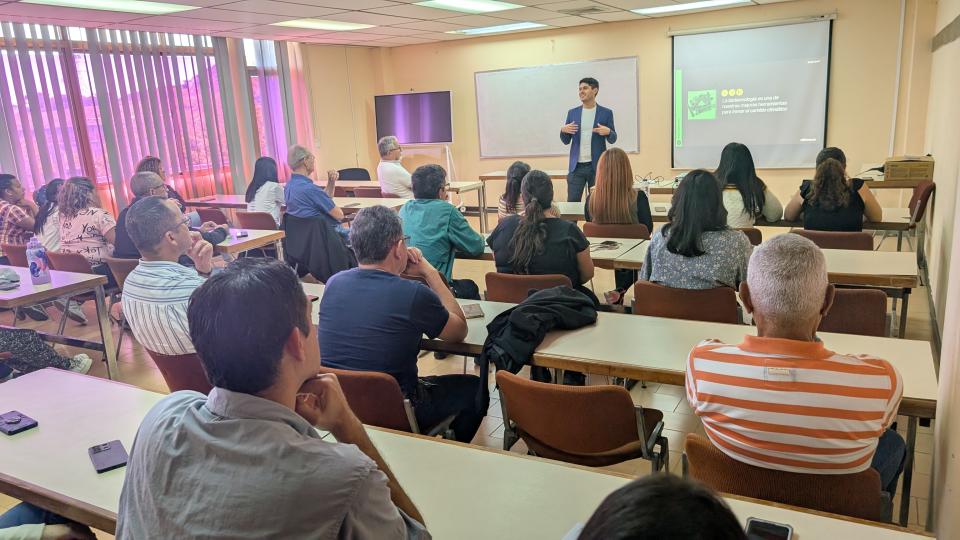 Dominguez gives a lecture about the project to professionals at the Venezuelan research facility IDEA