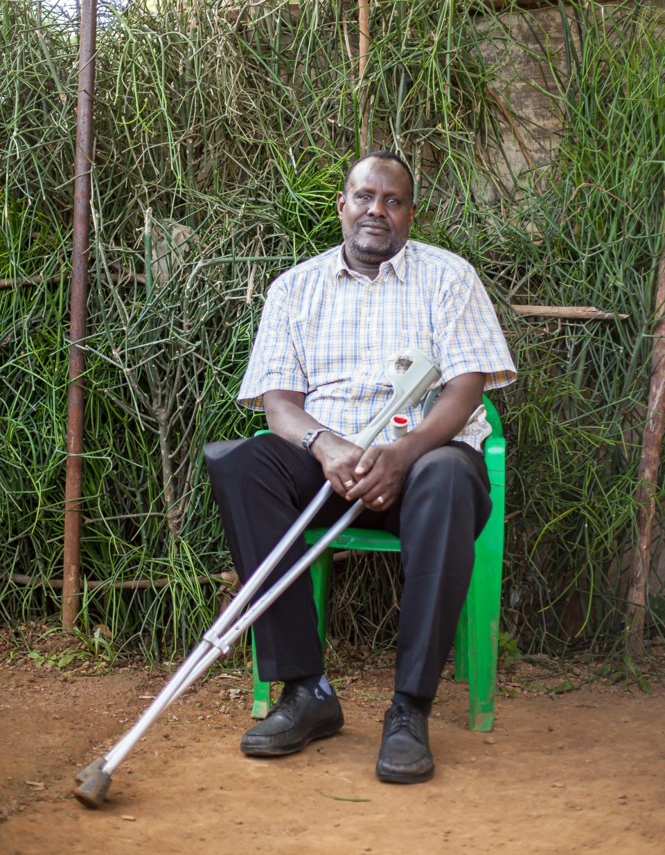 Ahmed Dahir, a Somali leader in the Nakivale Refugee Settlement, Uganda, photographed outside his home in 2019. 