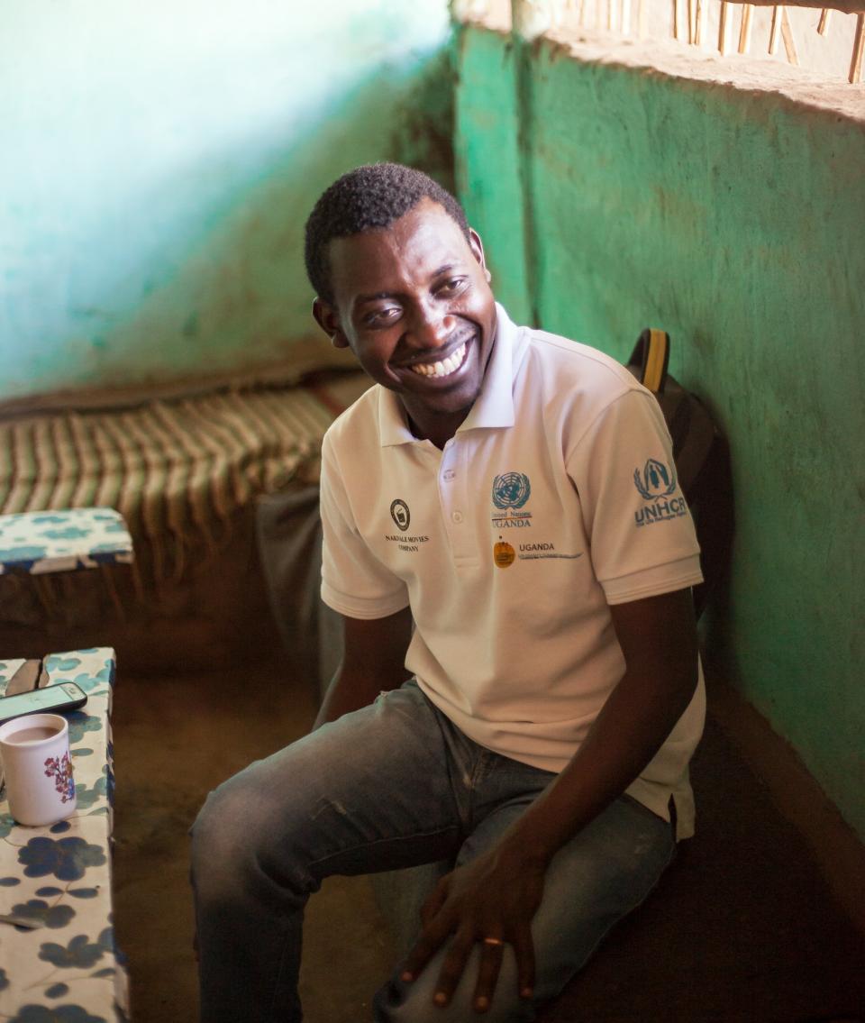 Adonis Mushongole Muganuzi, founder of the NGO YAREN, photographed at the Nakivale Refugee Settlement’s Kee Bar (a restaurant run by Ethiopian refugees) in 2019. 