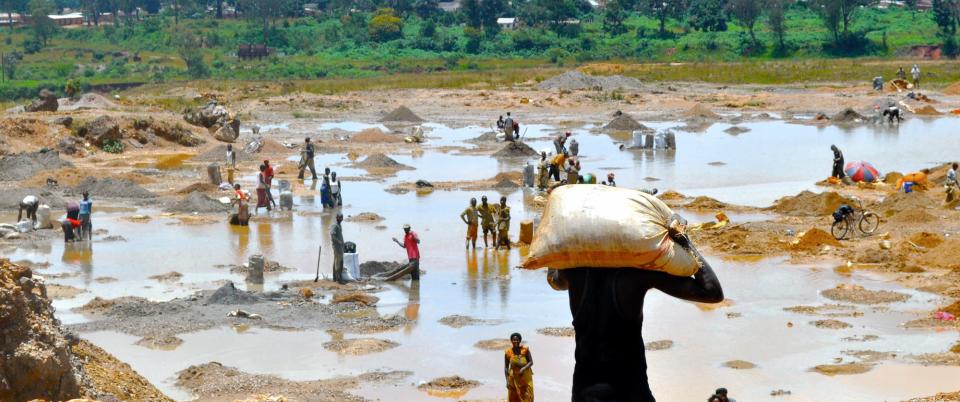 Workers washing copper ore in Katanga, Democratic Republic of the Congo