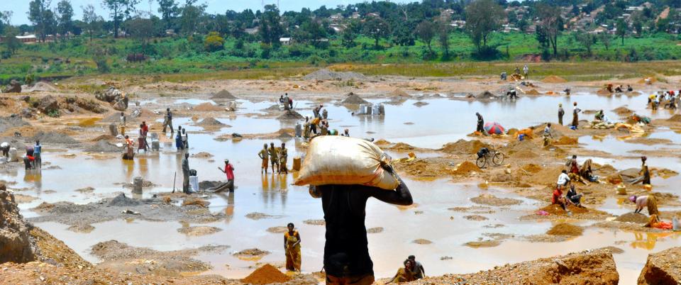 Workers washing copper ore in Katanga, Democratic Republic of the Congo