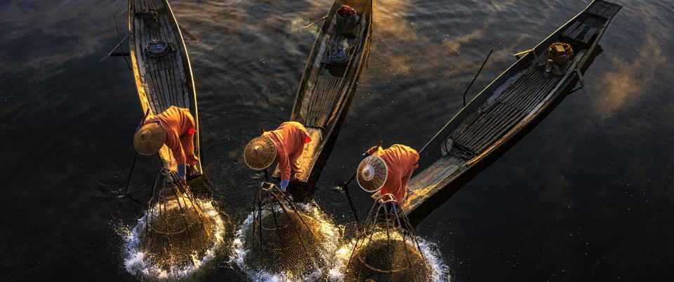 Three fishers in Myanmar