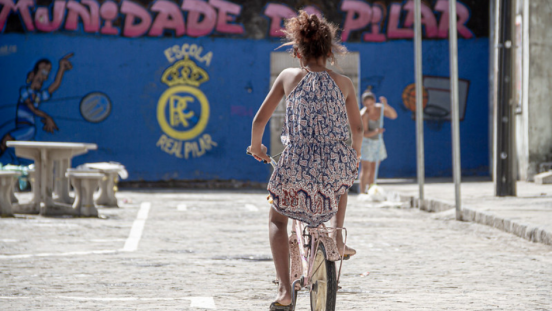 A woman riding a bicycle in Brazil