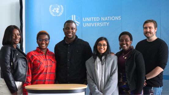 UNU-EHS Master's Programme students in front of UNU backdrop