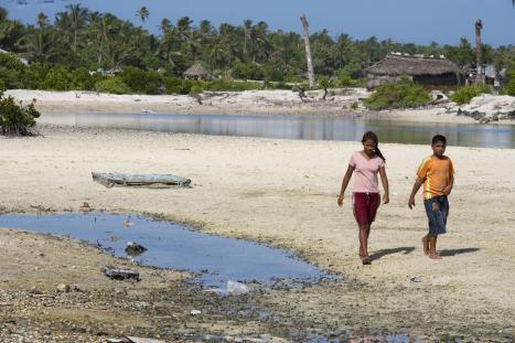 Locals in Tebikenikora, a village in the Pacific Island Nation of Kiribati.