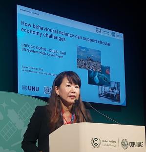 Sanae Okamoto speaking at COP28.