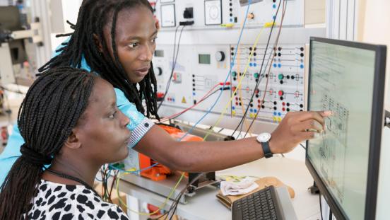 First year master's degree students at the World Bank-supported African Center of Excellence in Energy and Sustainable Development (at the College of Science and Technology, University of Rwanda) practice with wind, solar and other models/simulators in the renewable energy lab.