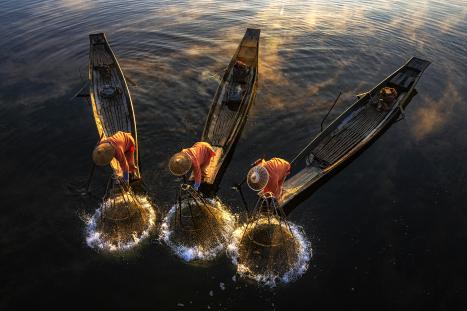 Three fishers in Myanmar