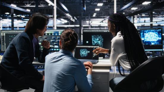 server-room-computer-scientists-using-ai-review-infrastructure-diagnostics