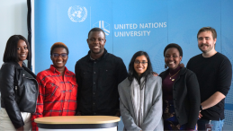 UNU-EHS Master's Programme students in front of UNU backdrop