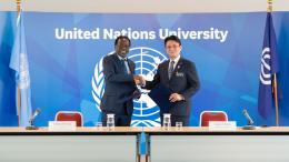 UNU Rector Tshilidzi Marwala and Naha City Mayor Satoru Chinen shake hands after signing a new MoU between UNU and Naha City, Okinawa, Japan. 
