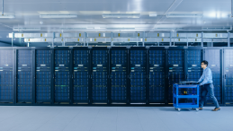 A man walks through a data centre