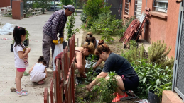 People plant an urban garden in Buenos Aires. 