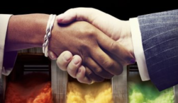 Photo depicts a handshake in front of a water dam with three streams of water colored red, yellow, green