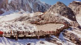 People Climbing Mountains in Lijiang, China 