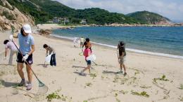 People cleaning Yung Sue Ha Beach 