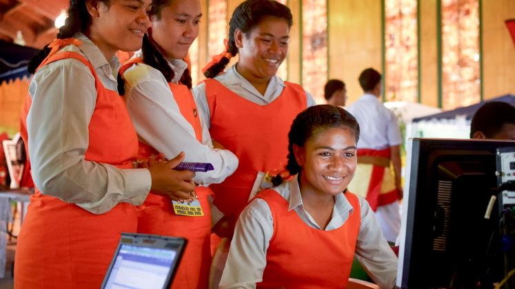 Students from Tonga's Tailulu College using new high-speed broadband services