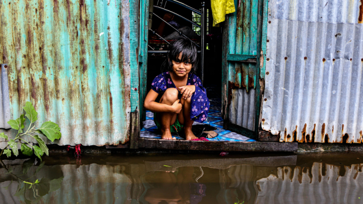 A child trapped by water in Bangladesh