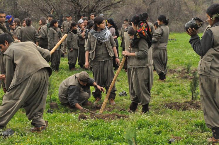 PKK Fighters plant trees at the Qandil Mountains