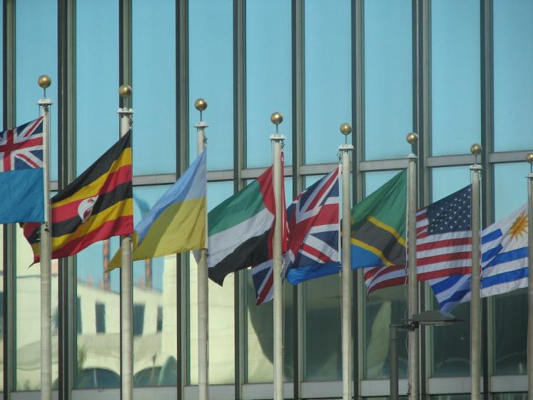 Flags in front of UN Headquarters building