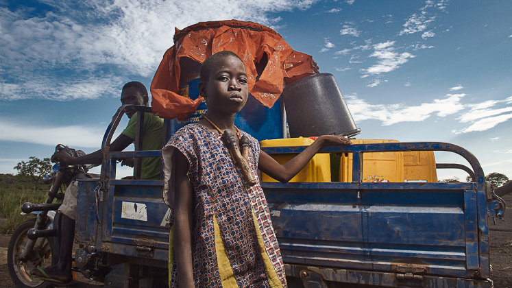 Girl carrying water