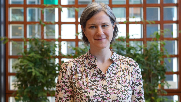 A woman poses for a portrait picture