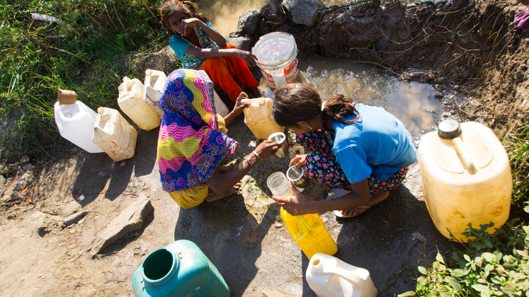 Rural women collecting water