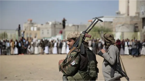 Armed Houthi fighters attend the funeral procession of Houthis who were killed in recent clashes with the Yemeni government, in Sanaa, Yemen, Nov. 24, 2021